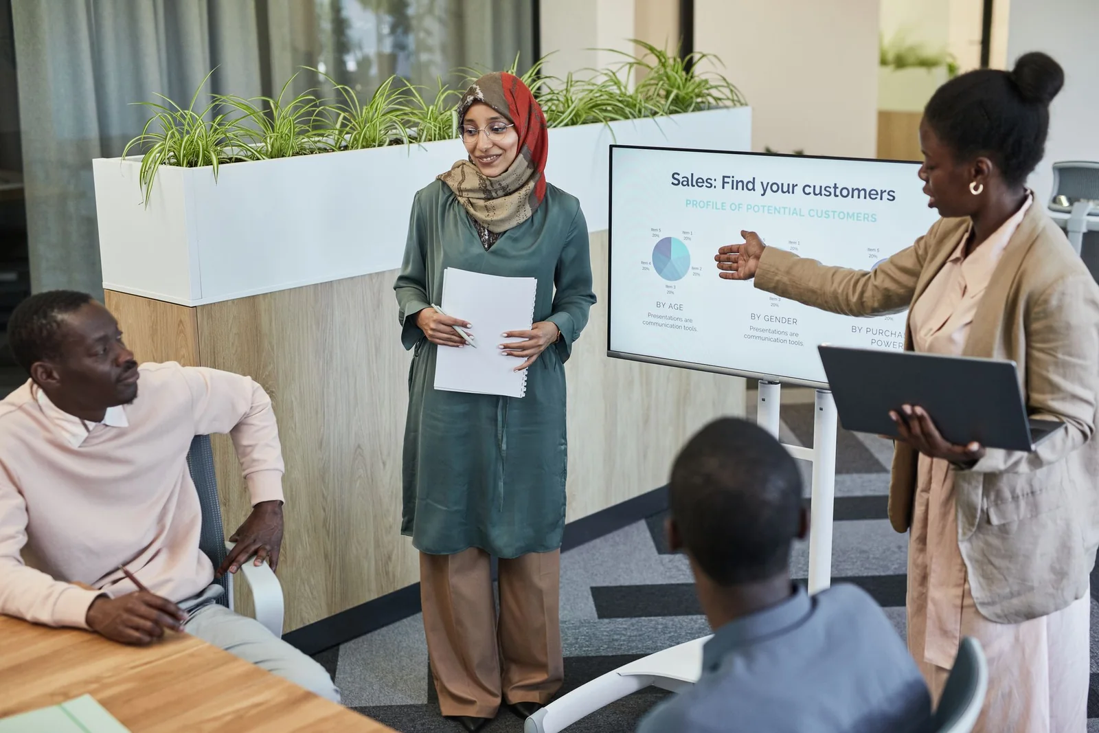 Professionals presenting and reviewing an AI workflow design.