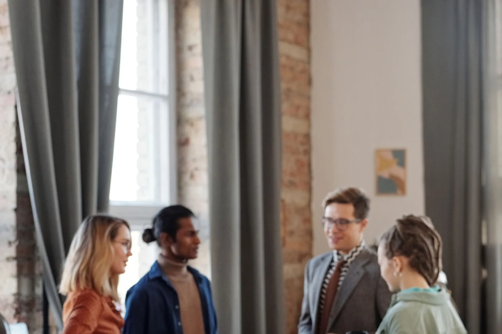 CRM operators reviewing shared customer data on a computer.