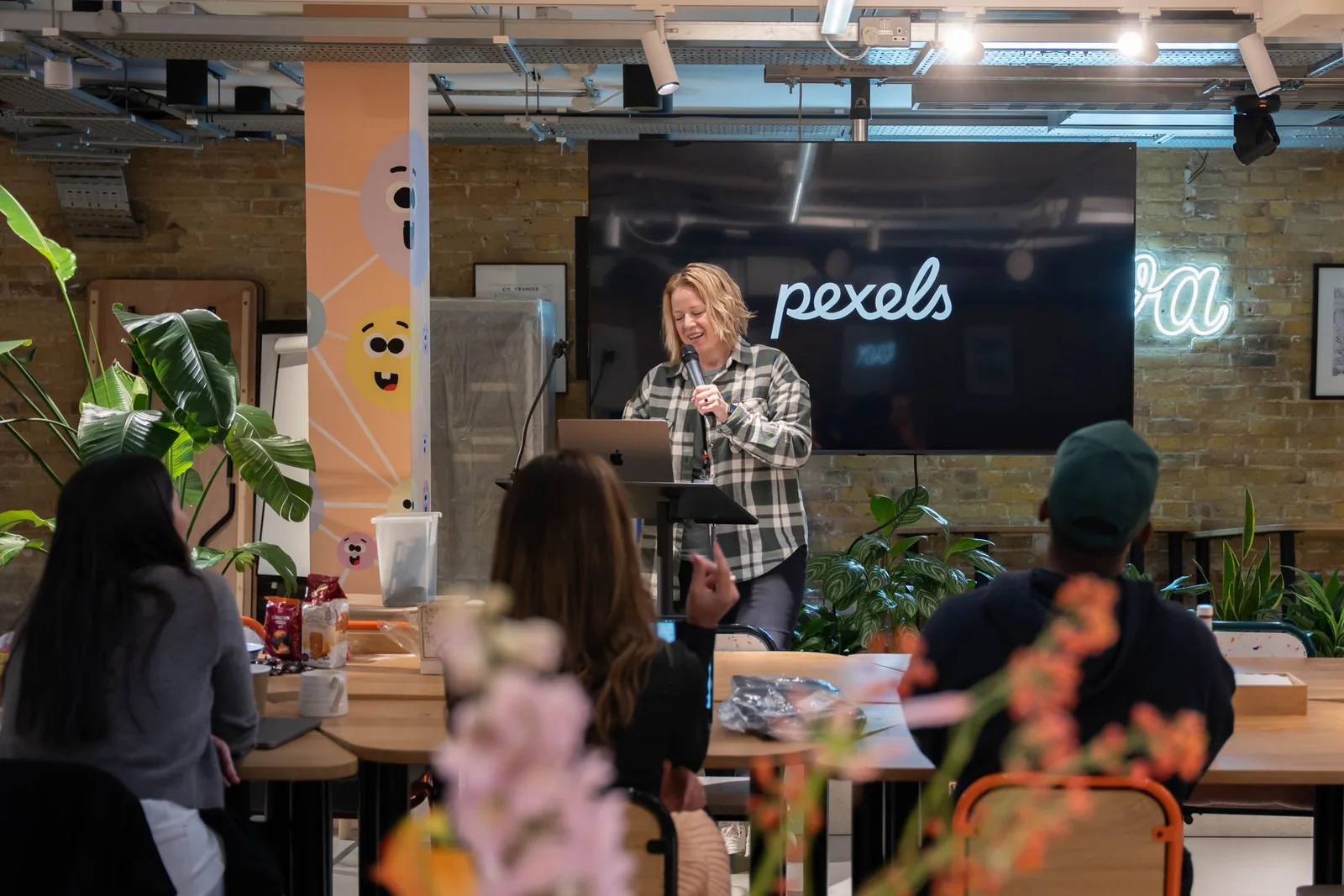 Facilitator leading a professional workshop in a modern office.