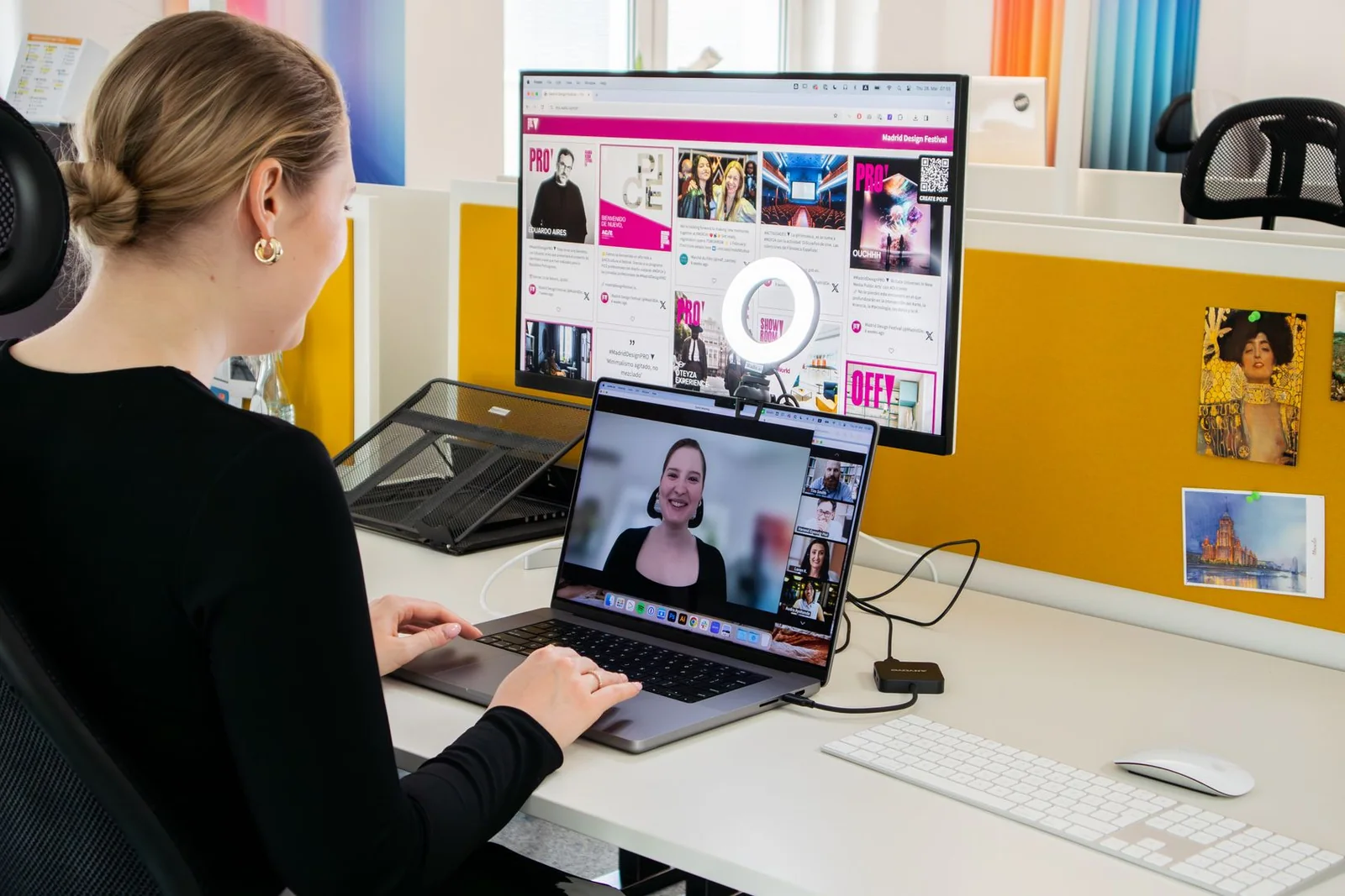 Virtual team professional organizing work on a laptop.