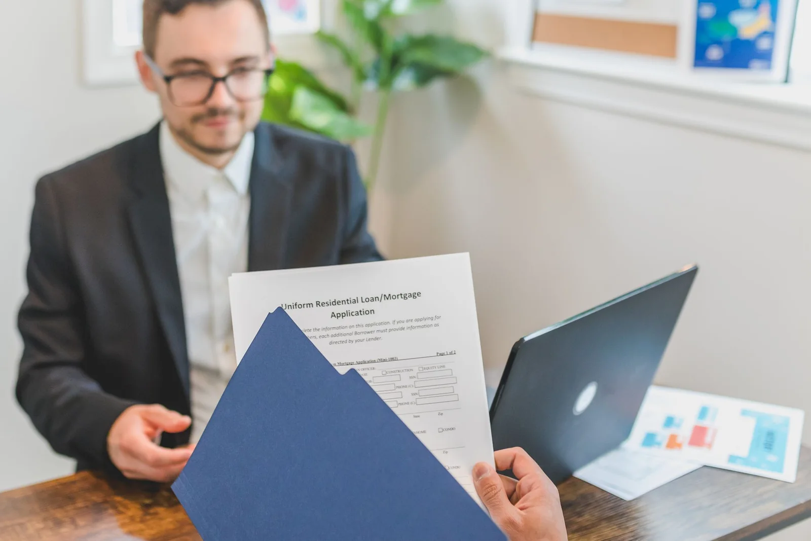 Business owner reviewing a document before a funding conversation