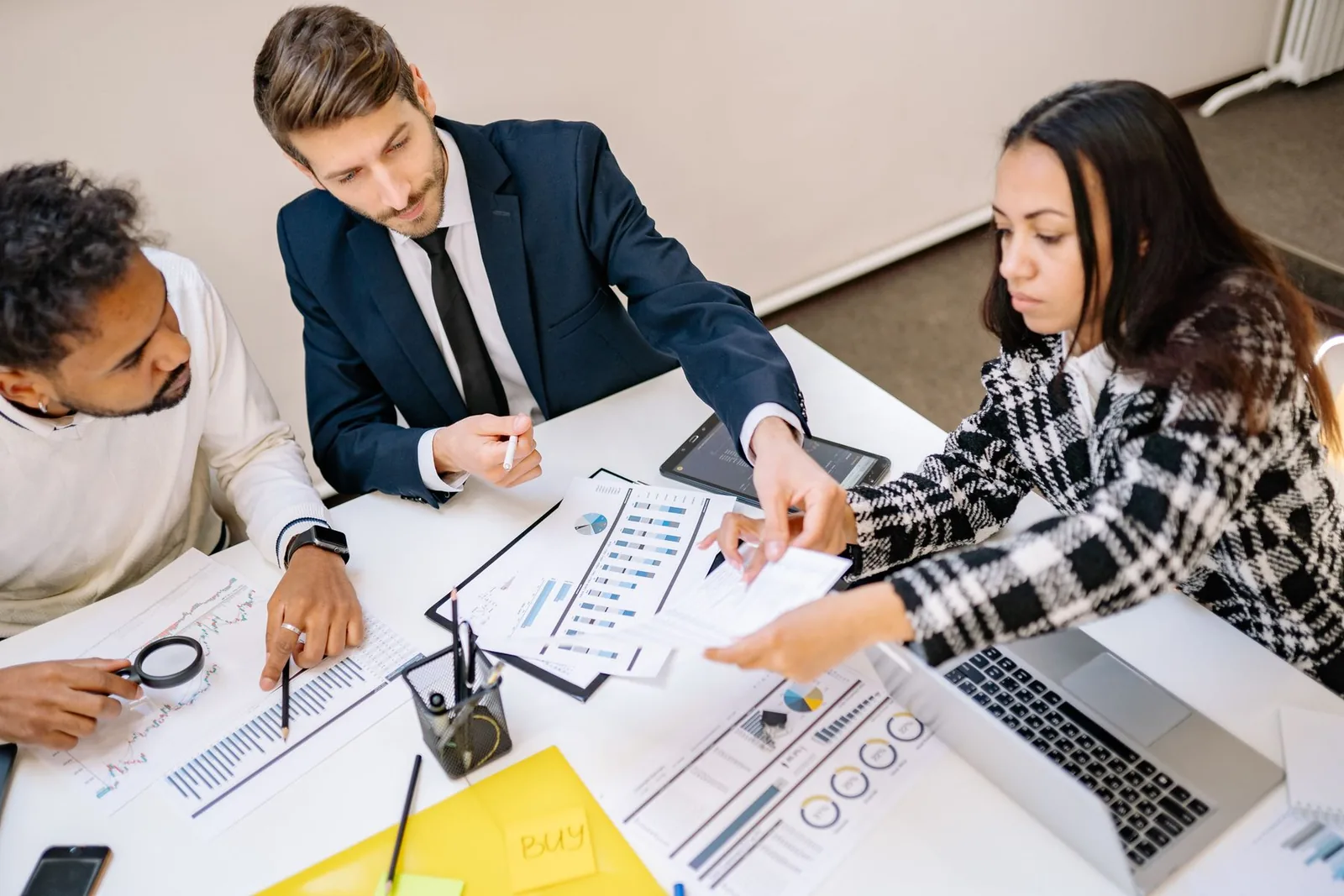 Business professionals collaborating on work related to Virtuous Virtual Assistants