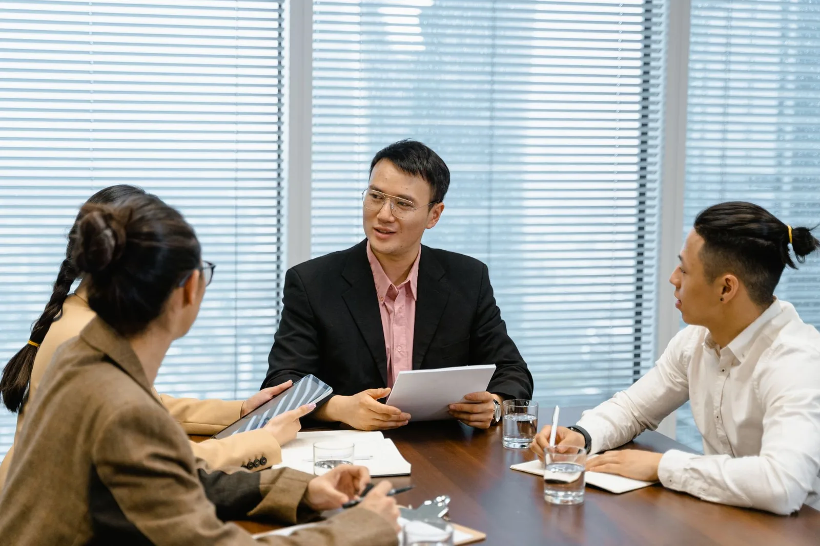 Business professionals collaborating on work related to Aurea Engineering