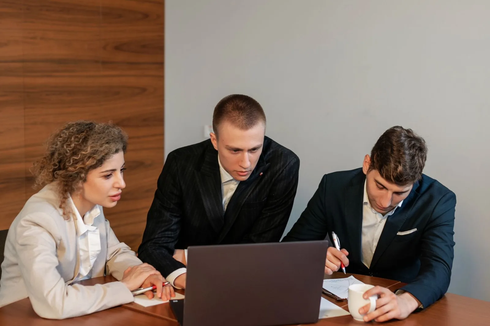 Business professionals collaborating on work related to Venture foundry services in Orem, Utah.