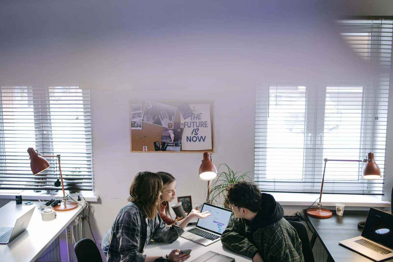 Business professionals collaborating on work related to Venture foundry services in Springville, Utah.
